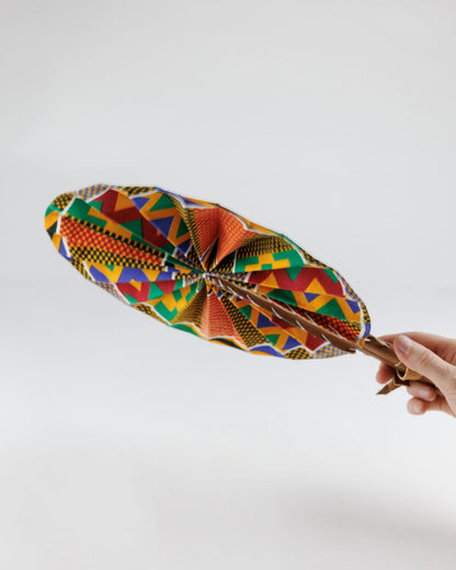 Fan- Collapses for easy storage, made from African wax fabric